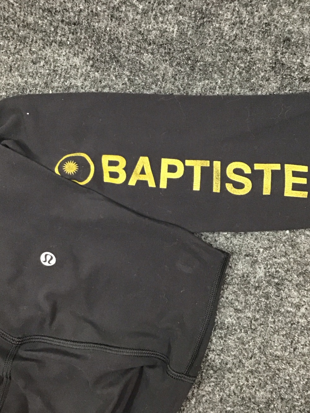 Lululemon Black Athletic Leggings with Gold 'Baptiste' Print S